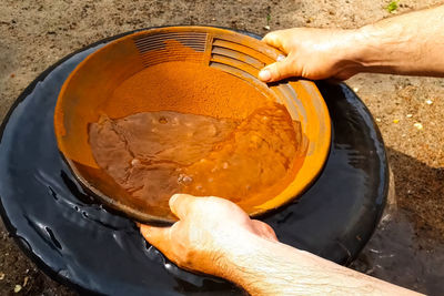 High angle view of man preparing food