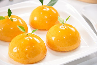 Close-up of orange slices in plate