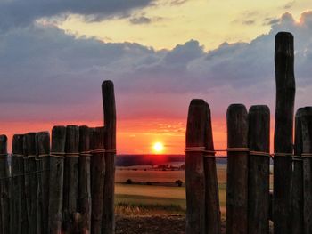 Scenic view of sunset over land