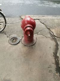 High angle view of fire hydrant on sidewalk