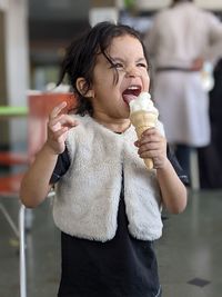 Close-up of young child enjoying icecream 