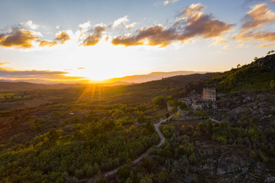 Drone aerial panorama of termas radium hotel serra da pena at sunset in sortelha, portugal