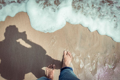 Low section of people on beach