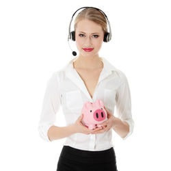 Portrait of a smiling young woman against white background
