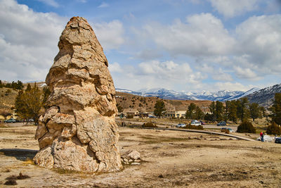 Rock formations on mountain against sky