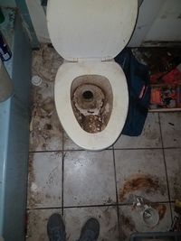 Abandoned shopping cart in bathroom