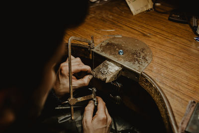 Close-up of hands working