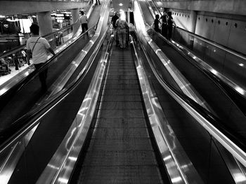 High angle view of people on escalator at subway station