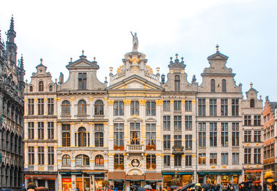Low angle view of grand place against sky