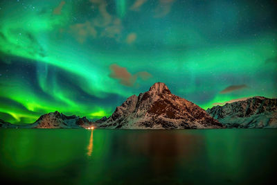 Scenic view of sea against sky at night