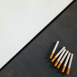 High angle view of cigarettes on table