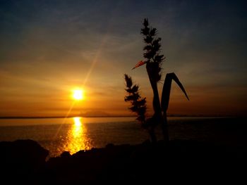 Scenic view of sea at sunset