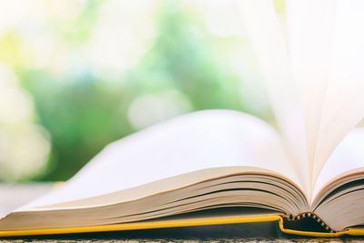 Close-up of open book on table