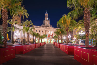 Illuminated buildings in city at night