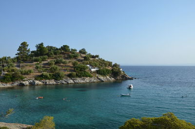 Scenic view of calm sea against clear sky