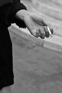 Close-up of hand against blurred background