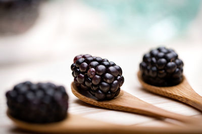 Close-up of blackberries on cutting board