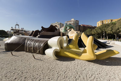 Panoramic view of mannequin against clear sky