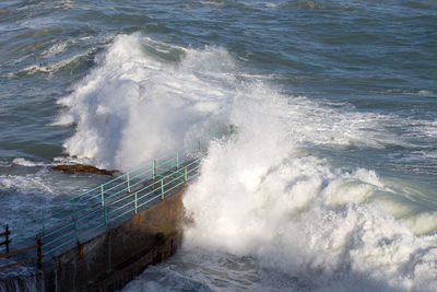 Waves splashing on shore