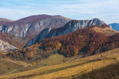 Scenic view of mountains against sky during autumn