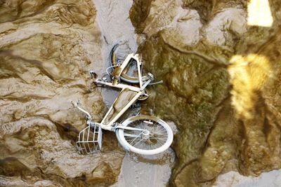 Close-up of bicycle on rock