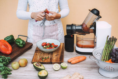 Man preparing food on cutting board