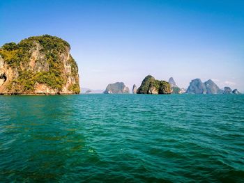 Scenic view of sea against clear blue sky