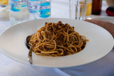 Close-up of noodles in plate on table