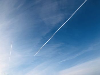 Low angle view of vapor trail in sky