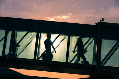Low angle view of bridge against sky during sunset