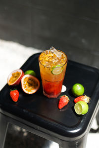 High angle view of fruits in glass on table