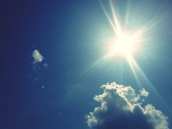 Sun shining through clouds