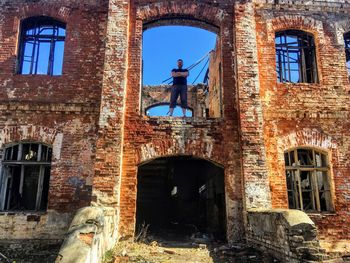 Low angle view of old abandoned building