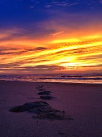 Scenic view of sea at sunset