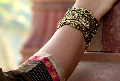 Cropped hand of woman wearing bangle