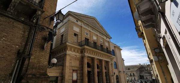 Low angle view of buildings against sky