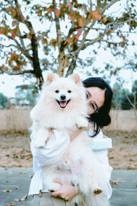 Portrait of woman with dog