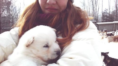 Close-up of woman with dog