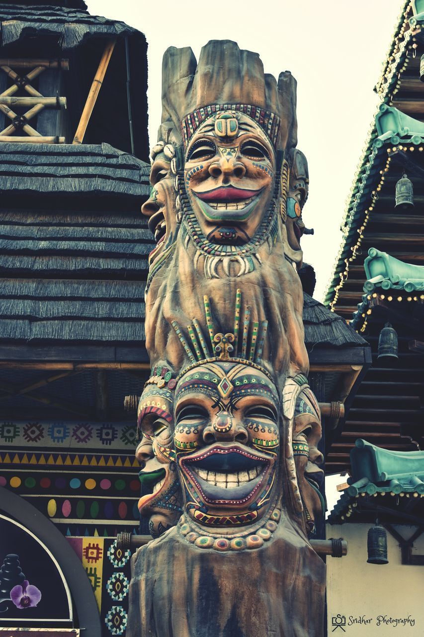 LOW ANGLE VIEW OF STATUE OF TEMPLE