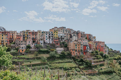 Buildings in city against sky