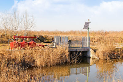 Water pump against sky