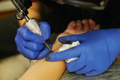 Close-up of hands working