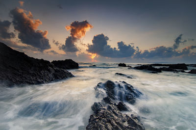 Waves splashing on rocks