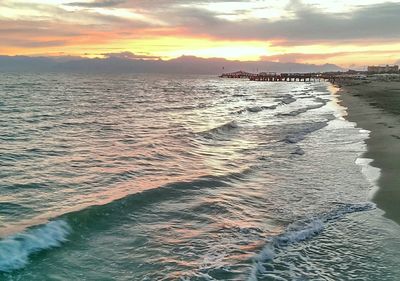 Scenic view of sea against cloudy sky