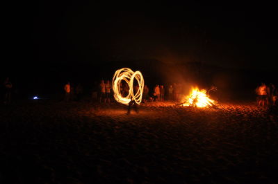 Light painting on field at night