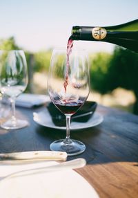 Close-up of wineglass on table