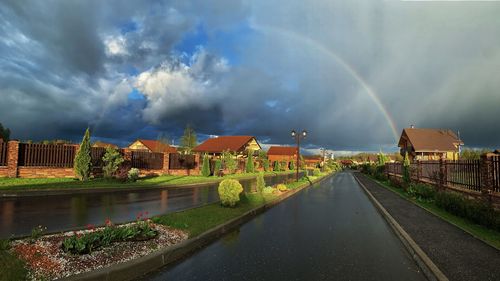 Panoramic view of rainbow over buildings in city
