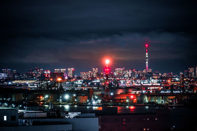 Illuminated buildings in city at night