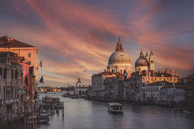 View of the canal grand and basilica of santa maria della salute from the accademia bridge  sunset