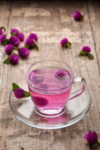 Close-up of pink flowers on table